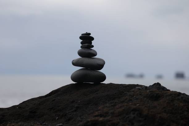 istock Closeup shot of rock balancing (also stone balancing, or stacking) 1464953262