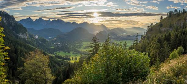 istock Aerial view of mountain landscape surrounded by dense trees 1464955856