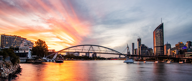 The special half red and half blue sky over the Goodwill Bridge and Brisbane River in the sunset