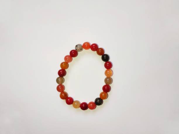 istock Handmade Carnelian Stretch Bracelet isolated on light background. 1464957047