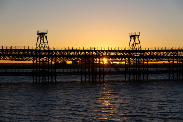 istock Old railway dock for ore over Rio Tinto in Huelva at sunset 1464957309