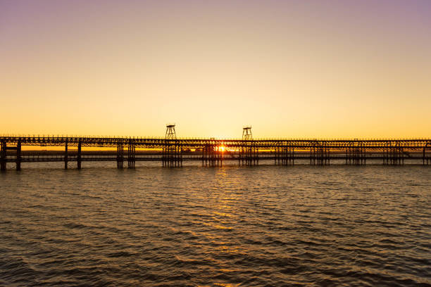 istock Waterscape and old railway dock over Rio Tinto in Huelva at sundown 1464957311