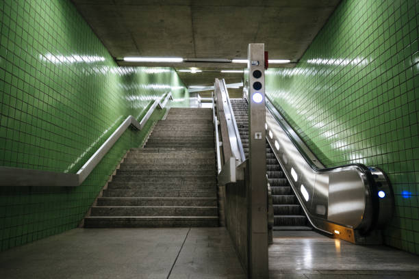 A view inside an empty escalator and staircase in a subway station in Germany