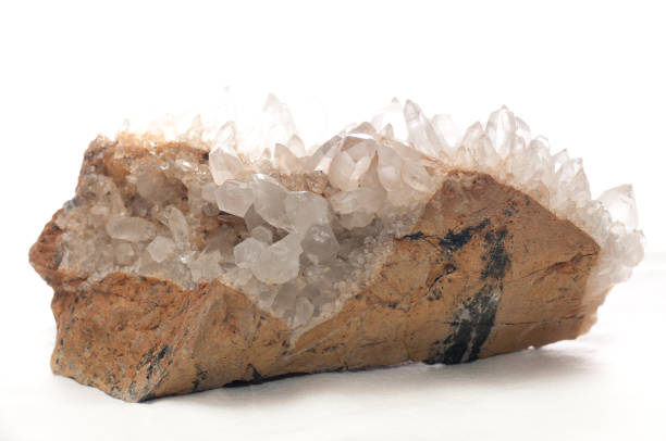 Quartz crystal cluster on white isolated background