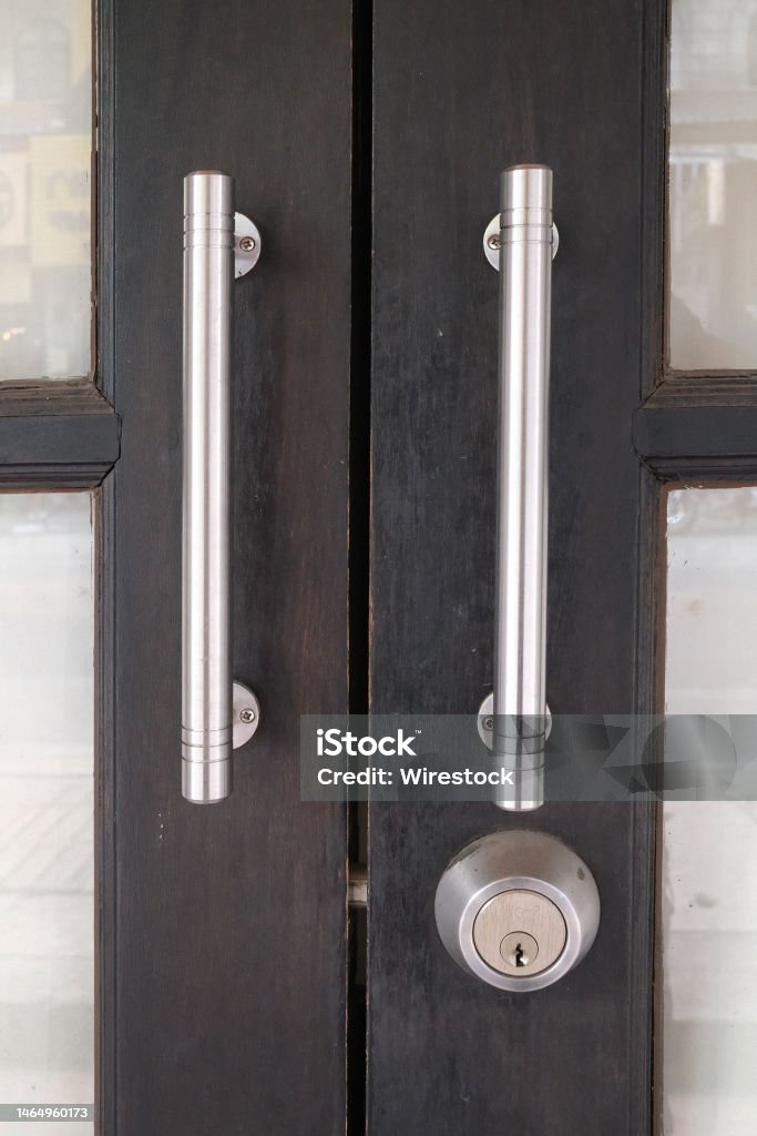 Aluminum door lock for wooden door. Aluminum door lockfor wooden door, thai style. Aluminum Stock Photo
