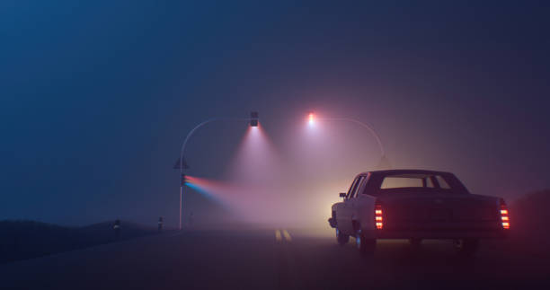 A car from the back in a darkness illuminated by purple light beams of traffic lights Mysterious image with a car from the back in a fog illuminated by traffic lights with purple light. Car on a stage in spotlights. Foggy street illuminated by traffic lights. Movie scene with a car in a fog car classic light tail stock pictures, royalty-free photos & images