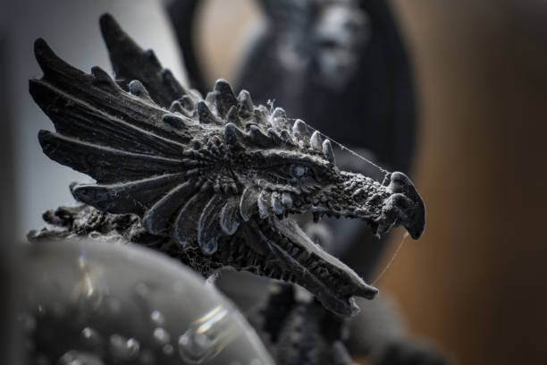 istock Head of a dragon sculpture with dust 1464966736