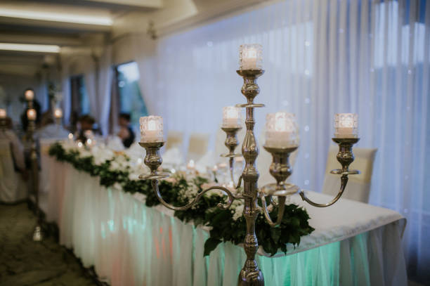 istock Selective focus shot of a vintage candlestick at a wedding ceremony hall 1464967190
