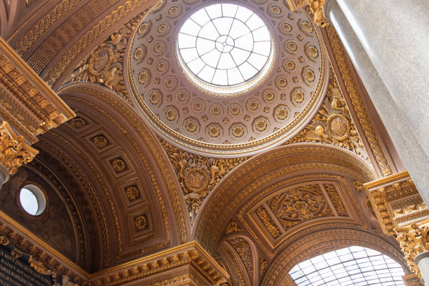 istock Low angle shot of a golden baroque building 1464967585