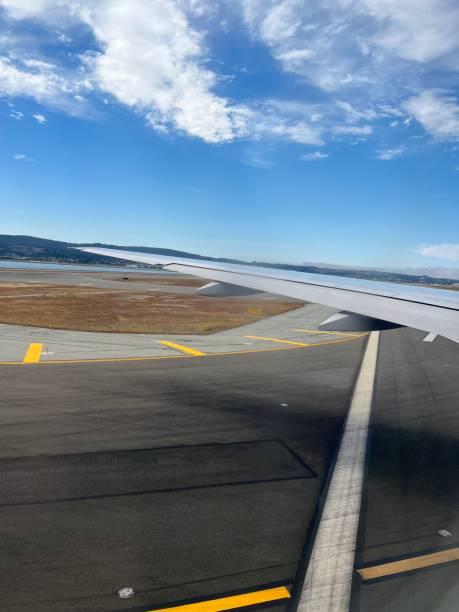 istock Aircraft wing at take off 1464969408