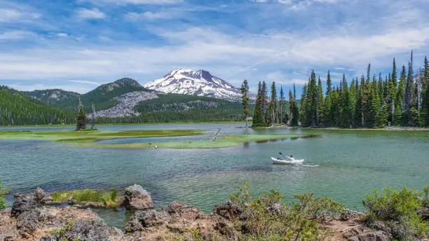 Photo of Scenic view of Sparks lake with mountainscape in the background