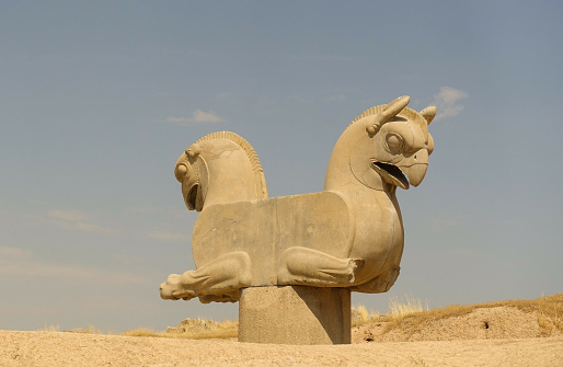 A two-headed griffin statue in the ancient ruins of an old city Persepolis, Iran
