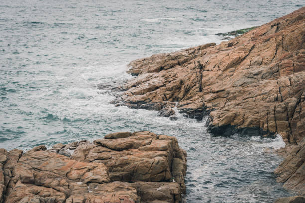 istock Beautiful view of a rocky seashore 1464971382