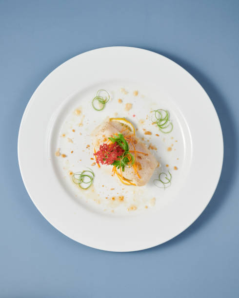 istock Vertical top view of a minimalistic salad on a white plate 1464971418