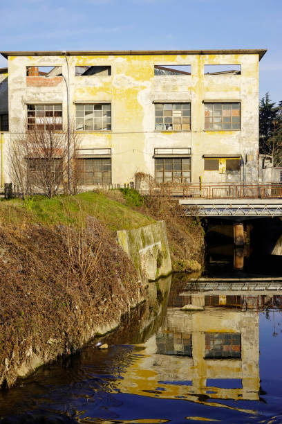 istock Canal with abandoned building 1464972617