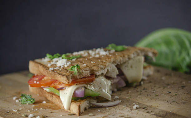 istock Cheese sandwich served on wood top 1464972848