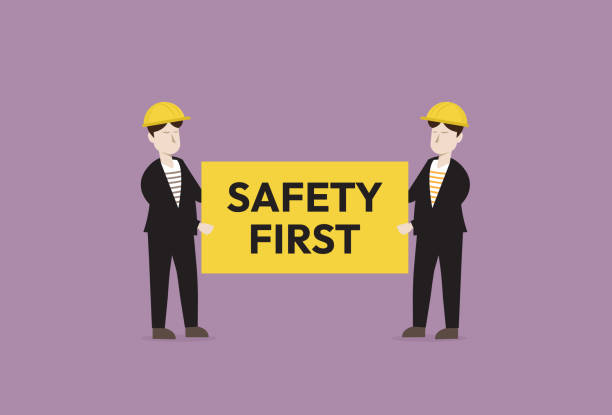 ilustrações de stock, clip art, desenhos animados e ícones de worker with safety first sign - construction industry business warning symbol