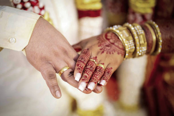 istock Asian Hindu Wedding Couples Hand together 1464975790