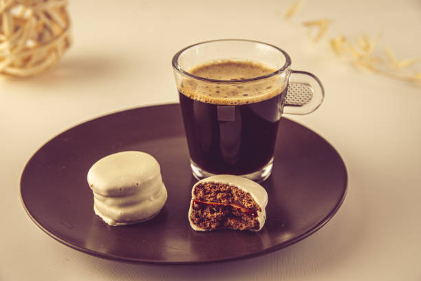 istock Plate of a cookie with a cup of coffee 1464978052