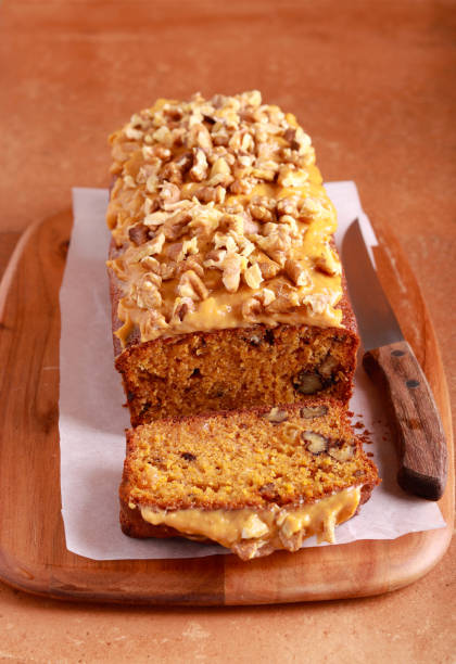 istock cake with caramel and walnut topping 1464978787