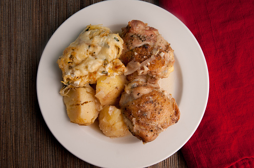 chicken thighs with baked squash gratin and potatoes