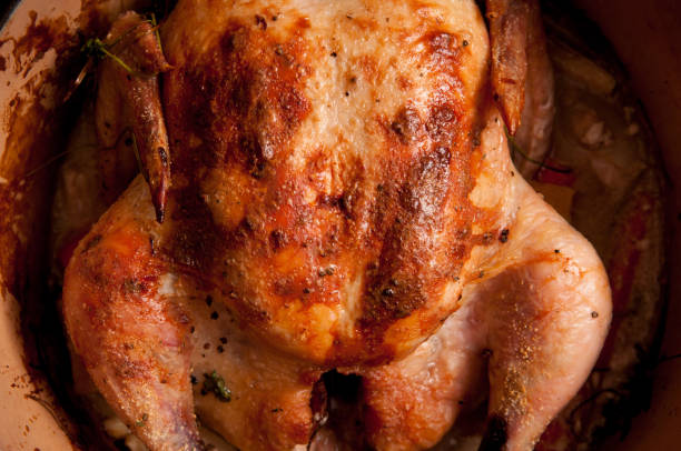 istock coconut whole chicken in a dutch oven 1464980110