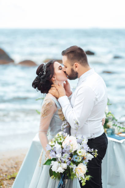 istock same couple with a bride in a blue dress walk 1464981011