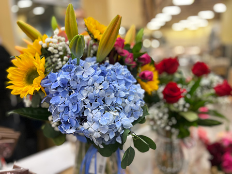 Wilted bouquet of flowers in store