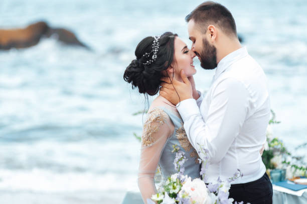istock same couple with a bride in a blue dress walk 1464984148