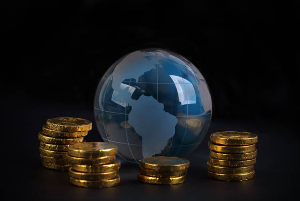 istock Golden coins and globe,Global Business concept 1464984844