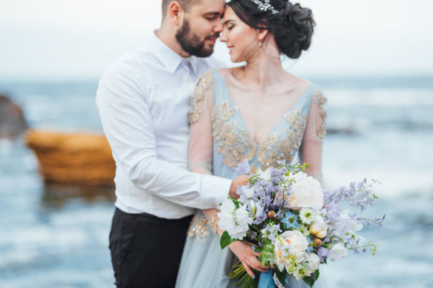 istock same couple with a bride in a blue dress walk 1464984852
