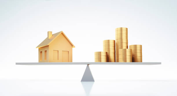 istock Seesaw with house and coins 1464988149
