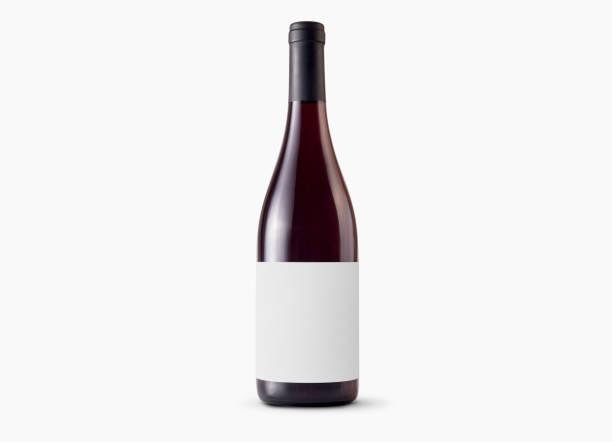 Red wine bottle with blank label on white background. Easily apply your custom design on the label. Red wine bottle with blank label on white background. Easily apply your custom design on the label. plant png photos stock pictures, royalty-free photos & images