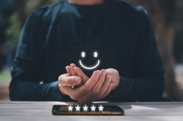 istock survey feedback Customer service satisfaction survey concept. man shows satisfaction by thumb up and five stars in satisfaction and give a feedback recommendation. happy emotion customer review 1464995036
