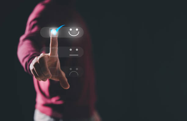 istock survey feedback Customer service satisfaction survey concept. businessman shows satisfaction by pressing face emoticon smile in satisfaction on virtual touch screen. happy emotion 1464995349