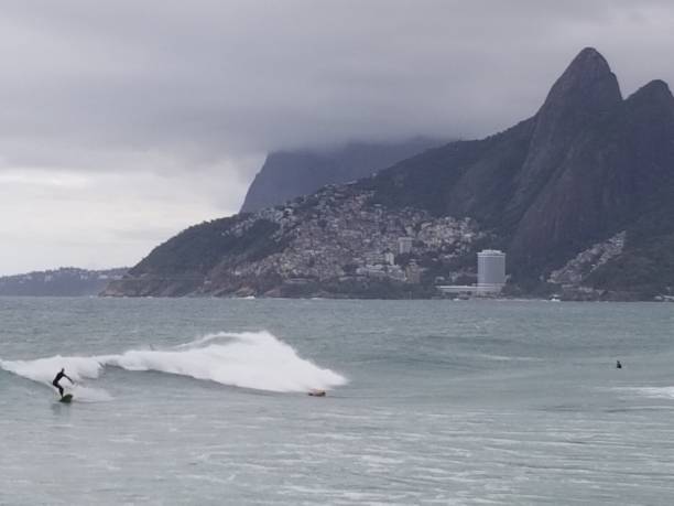 istock Peolple surfing in Ipanema beach 1464997824