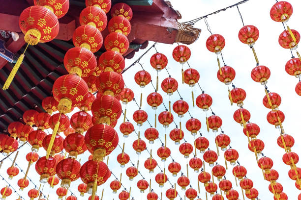 istock Red chinese lanterns in traditional chinese temple 1465000700