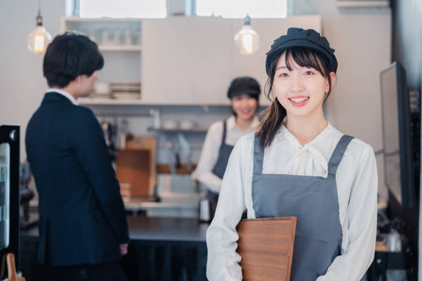 istock Cafe staff working with a smile 1465028673
