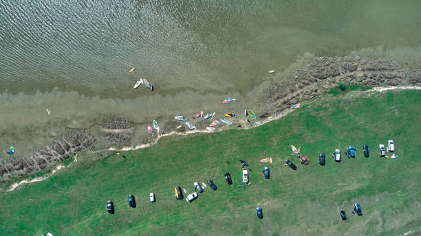 istock Windsurfing camp on a lake shore. 1465028675