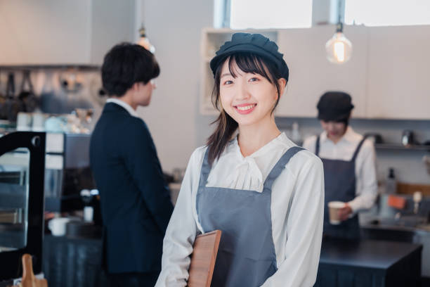 istock Cafe staff working with a smile 1465028692