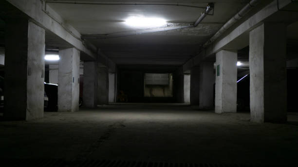 istock Dark parking with electric light. Spooky background 1465038102