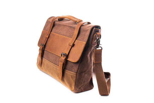 istock Men's bag on a white background. Brown shoulder bag. Leather and canvas bag 1465043525