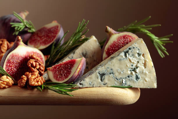 istock Blue cheese with figs, walnuts, and rosemary. 1465043835