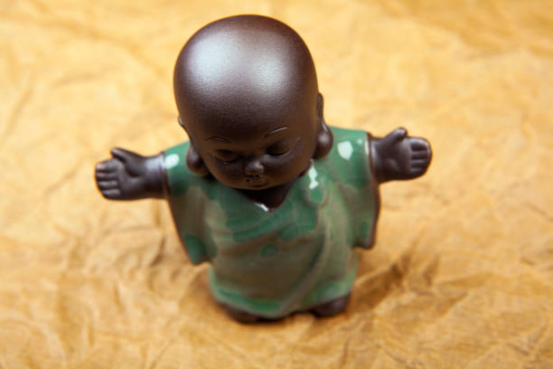 image of ceramic statue paper background