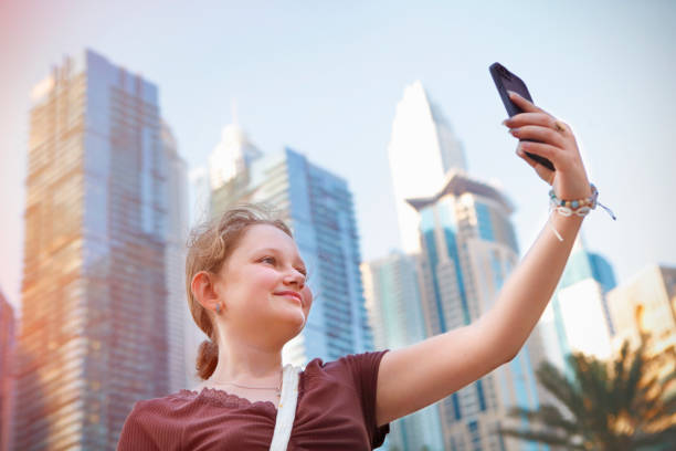 istock Girl taking selfie in Dubai marina 1465055486
