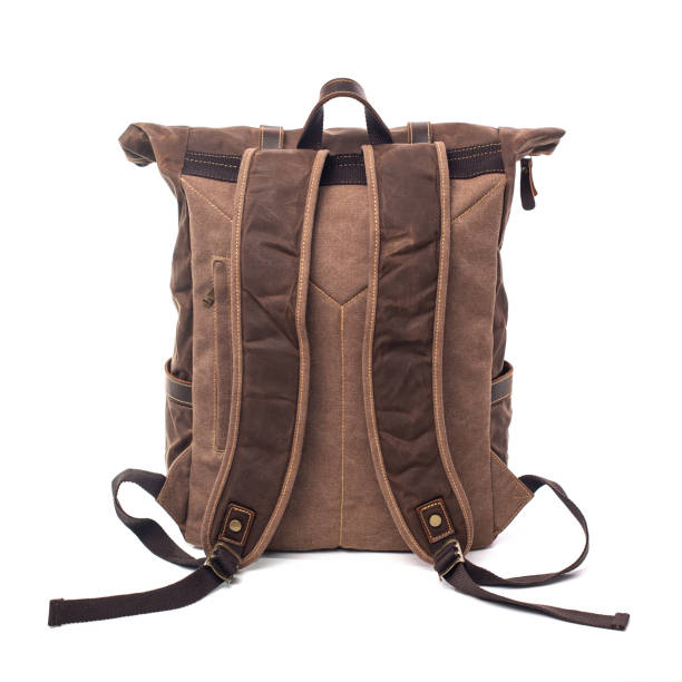istock Canvas Backpack accessories isolated on white background. Hand made backpack for travelers. 1465056077