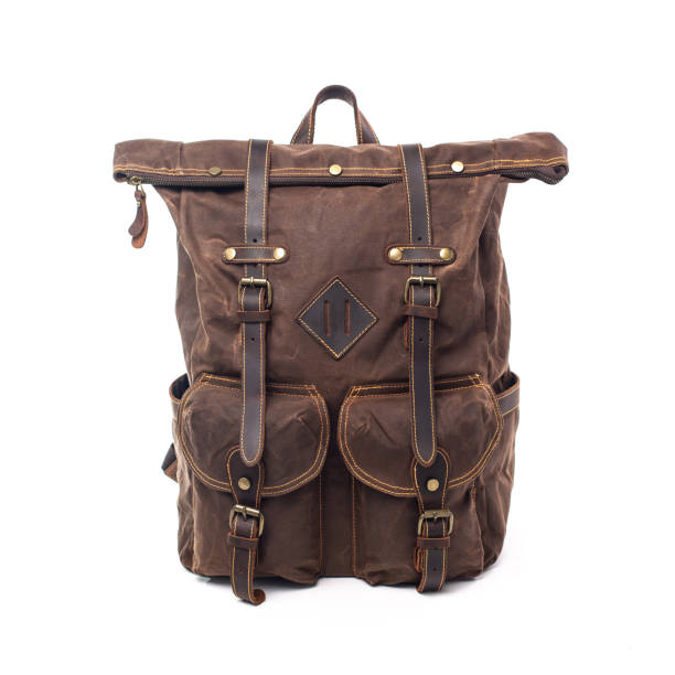 istock Canvas Backpack accessories isolated on white background. Hand made backpack for travelers. 1465056081
