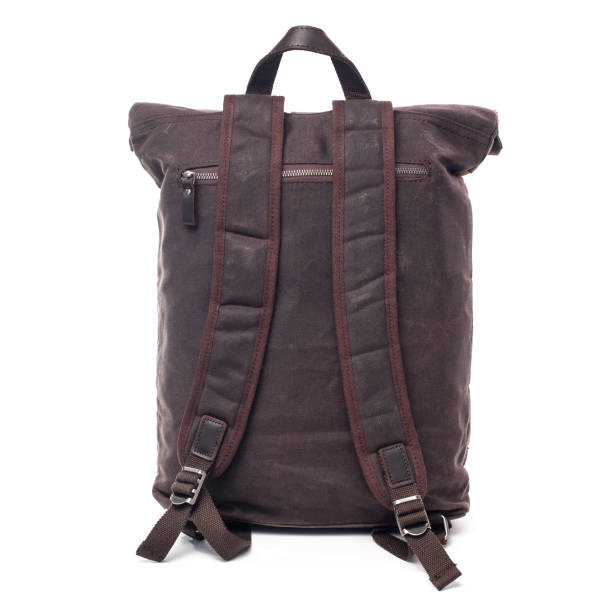 istock Canvas Backpack accessories isolated on white background. Hand made backpack for travelers. 1465056103