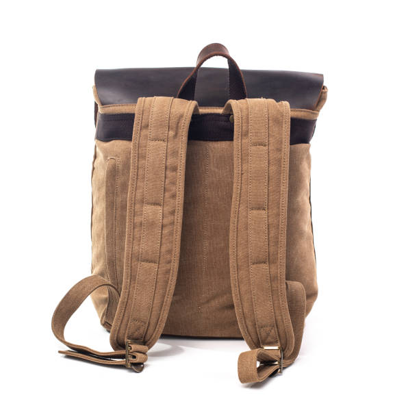 istock Canvas Backpack accessories isolated on white background. Hand made backpack for travelers. 1465056105