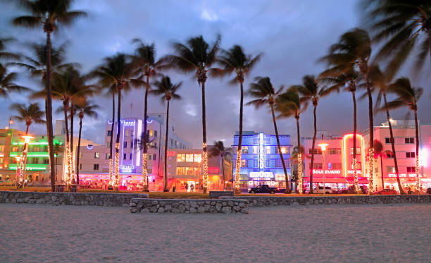 Night vibes at Ocean Drive, Art Deco Historic District in Miami Beach with illuminated hotels stock photo